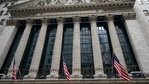 American flags hang outside of the New York Stock Exchange in New York. (AP) American flags hang outside of the New York Stock Exchange in New York. (AP)