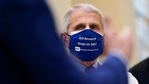 Dr. Anthony Fauci, director of the National Institute of Allergy and Infectious Diseases, listens as President Joe Biden speaks during a visit at the Viral Pathogenesis Laboratory at the National Institutes of Health (NIH) in this file picture. (AP Photo) Dr. Anthony Fauci, director of the National Institute of Allergy and Infectious Diseases, listens as President Joe Biden speaks during a visit at the Viral Pathogenesis Laboratory at the National Institutes of Health (NIH) in this file picture. (AP Photo)
