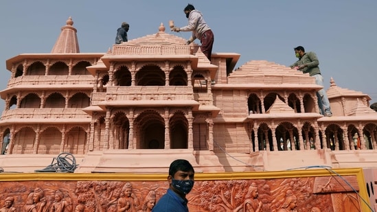 Workers give finishing touches to the model of the proposed Ram temple that Hindu groups want to build at a religious site in Ayodhya, on a tableau during a media preview of tableaux participating in the Republic Day parade in New Delhi, India January 22, 2021. (REUTERS)