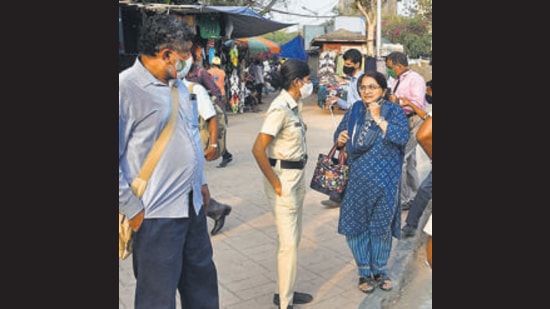 Mumbai Police team takes action against a citizen caught without a mask outside Churchgate station on Monday. (Bhushan Koyande/HT photo) Mumbai Police team takes action against a citizen caught without a mask outside Churchgate station on Monday. (Bhushan Koyande/HT photo)