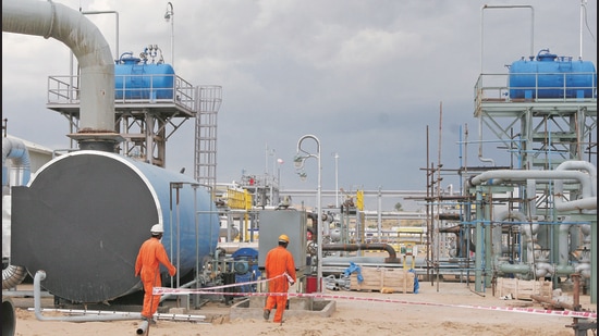 Cairn India employees work at a storage facility for crude oil. (HT Archive) Cairn India employees work at a storage facility for crude oil. (HT Archive)
