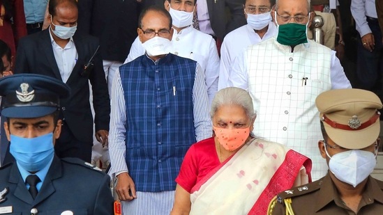 Bhopal: Madhya Pradesh Governor Anandiben Patel being escorted by Speaker Girish Gautam, Chief Minister Shivraj Singh Chouhan.(PTI)