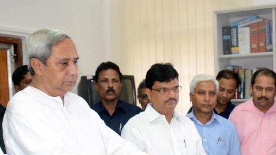 File photo: Odisha finance minister Niranjan Pujari along with chief minister Naveen Patnaik.(PTI)