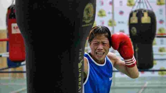 MC Mary Kom punches a bag during a training session at Balewadi Stadium in Pune.(REUTERS) MC Mary Kom punches a bag during a training session at Balewadi Stadium in Pune.(REUTERS)