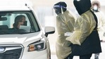 A passenger is screened and gets a COVID-19 test while entering Canada from the United States at the land border crossing in Saint-Bernard-de-Lacolle, Quebec, on February 22.(AP Photo) A passenger is screened and gets a COVID-19 test while entering Canada from the United States at the land border crossing in Saint-Bernard-de-Lacolle, Quebec, on February 22.(AP Photo)