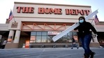Passers-by walk near an entrance to a Home Depot home improvement store in Boston. (AP) Passers-by walk near an entrance to a Home Depot home improvement store in Boston. (AP)