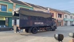In this image taken from a video, an immigration truck with unidentified people onboard is driven on a road that leads to Lumut Naval Base Tuesday, in Lumut, Malaysia. (AP) In this image taken from a video, an immigration truck with unidentified people onboard is driven on a road that leads to Lumut Naval Base Tuesday, in Lumut, Malaysia. (AP)