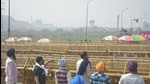 Demonstrators near police barricading at the Ghazipur border protest site as the agitation against new farm laws continues, in New Delhi, on Monday. (Sakib Ali/HT Photo) Demonstrators near police barricading at the Ghazipur border protest site as the agitation against new farm laws continues, in New Delhi, on Monday. (Sakib Ali/HT Photo)