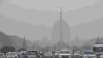 Vehicles ply amid a dense layer of smog at Rajpath, in New Delhi.(HT Photo) Vehicles ply amid a dense layer of smog at Rajpath, in New Delhi.(HT Photo)