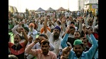 Farmers shouting slogans at the demonstration site during the ongoing protest against the new farm laws, Ghazipur , February 20 (ANI) Farmers shouting slogans at the demonstration site during the ongoing protest against the new farm laws, Ghazipur , February 20 (ANI)