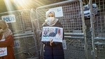 A member of the Muslim Uighur minority holds a placard as she demonstrates in front of the Chinese consulate on December 30, 2020, in Istanbul in this file picture. (AFP) A member of the Muslim Uighur minority holds a placard as she demonstrates in front of the Chinese consulate on December 30, 2020, in Istanbul in this file picture. (AFP)