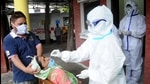 A sample being collected for the Covid-19 test. Health officials said the limited increase in the number of infections is not a cause of worry yet. (HT file photo) A sample being collected for the Covid-19 test. Health officials said the limited increase in the number of infections is not a cause of worry yet. (HT file photo)