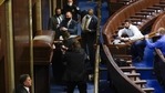 US Capitol Police with guns drawn stand near a barricaded door as rioters try to break into the House Chamber at the US Capitol on Jan. 6, 2021.(AP File) US Capitol Police with guns drawn stand near a barricaded door as rioters try to break into the House Chamber at the US Capitol on Jan. 6, 2021.(AP File)