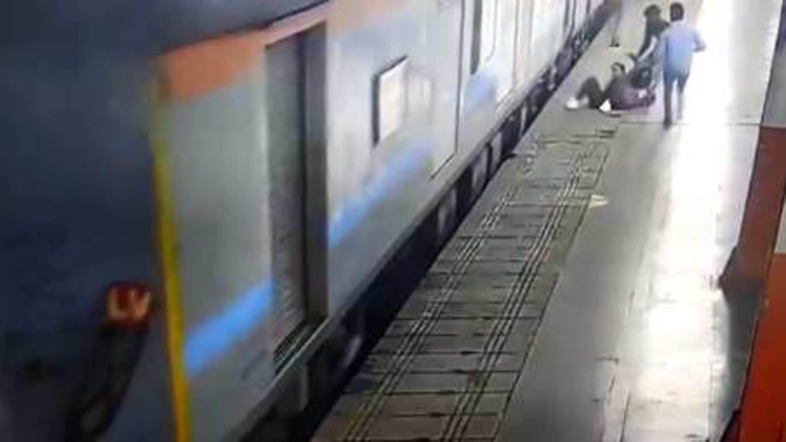 Alert cop saves woman from being crushed under train at Lucknow. Watch | Hindustan Times