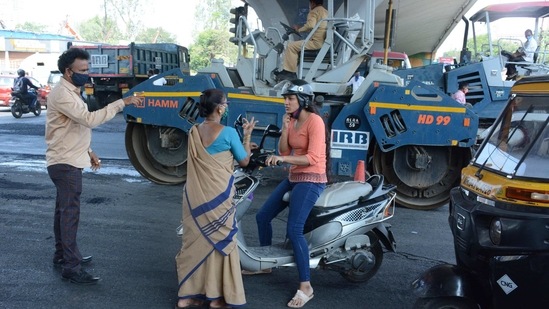 A motorist out without a face mask being fined by municipal marshals as Covid-19 records an uptick, in Thane on February 22. The instructions came as the country witnessed a spike of 86,711 cases of the coronavirus disease over the last week, taking the infection tally close to 11 million.(Praful Gangurde / HT Photo)