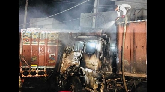The two truck that caught flames in Jagroan on Tuesday. (HT PHOTO) The two truck that caught flames in Jagroan on Tuesday. (HT PHOTO)