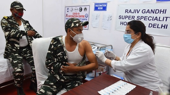 A CRPF personnel receives a dose of Covishield, a Covid-19 vaccine, at a hospital in New Delhi on February 22. Meanwhile, India’s cumulative vaccination coverage has crossed 1.17 crore as of February 23 according to the health ministry. No new Covid-19 fatalities were reported in 21 States and UTs in the last 24 hours.(Raj K Raj / HT Photo)