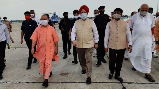 Union civil aviation minister Hardeep Puri at Kushinagar airport with Uttar Pradesh chief minister yogi Adotyanath.(Twitter/@HardeepSPuri)