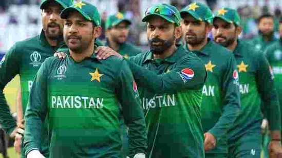 Pakistan's captain Sarfaraz Ahmed (2L) leads his team off of the pitch after winning the 2019 Cricket World Cup group stage match between England and Pakistan at Trent Bridge in Nottingham(AFP)