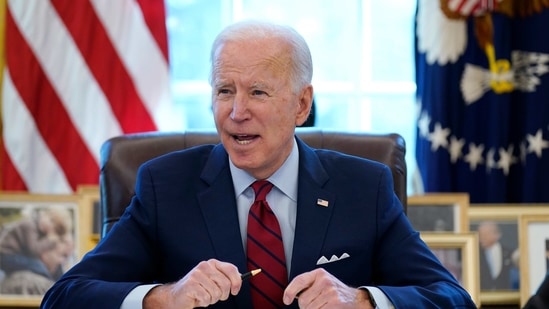 President Joe Biden signs a series of executive orders in the Oval Office of the White House in Washington.(File Photo / AP) President Joe Biden signs a series of executive orders in the Oval Office of the White House in Washington.(File Photo / AP)