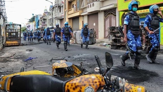 Three people died after a mob went on a rampage in reaction to a communally charged Facebook post by a relative of Pulakeshinagar Congress legislator, Akhanda Srinivas Murthy.(AFP PHOTO.) Three people died after a mob went on a rampage in reaction to a communally charged Facebook post by a relative of Pulakeshinagar Congress legislator, Akhanda Srinivas Murthy.(AFP PHOTO.)