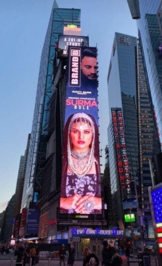 Himanshi Khurana on a Times Square billboard.
