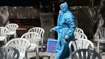 On Wednesday, the health ministry said that 19 states, UTs reported no Covid-19 related deaths. In picture - A healthworker carries RT-PCR Covid-19 samples. (AFP) On Wednesday, the health ministry said that 19 states, UTs reported no Covid-19 related deaths. In picture - A healthworker carries RT-PCR Covid-19 samples. (AFP)