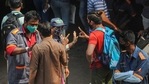 Mumbai: BMC officials penalise a commuter for not wearing masks, amid rise in coronavirus cases across Maharashtra, in Mumbai, Tuesday, Feb. 23, 2021. (PTI Photo)(PTI02_23_2021_000222A)(PTI) Mumbai: BMC officials penalise a commuter for not wearing masks, amid rise in coronavirus cases across Maharashtra, in Mumbai, Tuesday, Feb. 23, 2021. (PTI Photo)(PTI02_23_2021_000222A)(PTI)