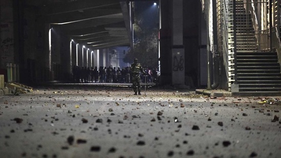 Outside the metro station, a road full of stones and debris resulting from the clashes between rioters in Maujpur, New Delhi in February last year. The stretch that connects Jaffrabad metro station to Maujpur-Babarpur metro station witnessed heavy stone pelting, tear gas shells, and the looting or burning of shops.(Sonu Mehta / HT Archive)