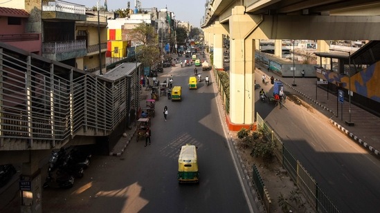 A view of the Maujpur Babarpur metro station area, a year after. While the buildings and houses have been reconstructed and repainted, the concrete fence on the road divider was never reconstructed. A grim reminder of the violence in 2020.(Amal KS / HT Photo)