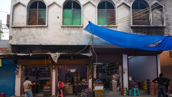 A year after the Delhi riots, a scene from outside Badi Masjid, Ashok Nagar, New Delhi, where some shops have reopened.(Amal KS / HT Photo)