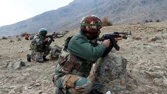 Army troopers near the encounter site in Shalgul forests in Anantnag district on Wednesday.(ANI)