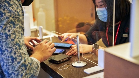 A screen separates an employee assisting a customer at the Oversea-Chinese Banking Corp. (OCBC) Centre Branch in Singapore, on Monday, Feb. 23, 2021. (Bloomberg/ Representative image) A screen separates an employee assisting a customer at the Oversea-Chinese Banking Corp. (OCBC) Centre Branch in Singapore, on Monday, Feb. 23, 2021. (Bloomberg/ Representative image)