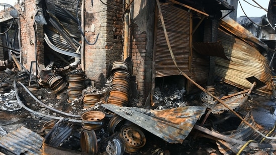 A view of a tyre shop that was gutted in the Delhi riots at Gokulpuri in New Delhi last year. (Biplov Bhuyan/ HT Archive)