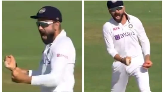 Virat Kohli celebrates the wicket of Joe Root