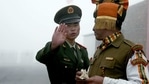 A Chinese soldier gestures next to an Indian soldier at the Nathu La border crossing between India and China in India's northeastern Sikkim state(AFP/File Photo) A Chinese soldier gestures next to an Indian soldier at the Nathu La border crossing between India and China in India's northeastern Sikkim state(AFP/File Photo)