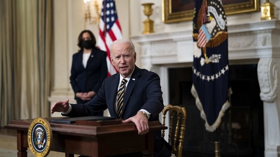 U.S. President Joe Biden in the State Dining Room of the White House in Washington, DC, US, on Wednesday, Feb. 24, 2021. Biden revoked a proclamation from his predecessor that blocked many green card applicants from entering US.(Bloomberg)