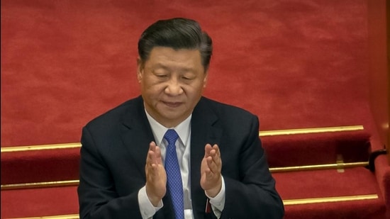 A file photo of Chinese President Xi Jinping applauding during the closing session of China's National People's Congress (NPC) in Beijing. (AP/ FILE)