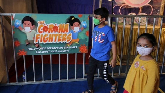 Indian children wearing face masks as a precaution against Covid-19. (AP) Indian children wearing face masks as a precaution against Covid-19. (AP)