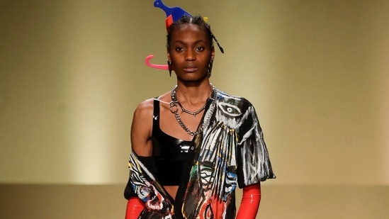 A model wears a creation by fashion designer Pape Macodou Fall as part of the Black Lives Matter Fall/Winter 2021/22 collective fashion show, presented in Milan, Italy, Wednesday, Feb. 17, 2021. 2021. (AP)
