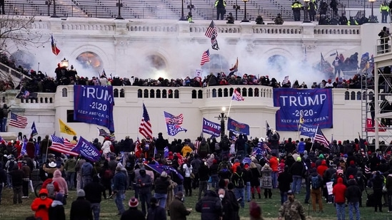 Violent rioters, loyal to President Donald Trump, storm the Capitol in Washington.(AP Photo )