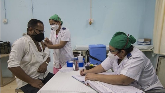 A man being vaccinated against Covid-19 at Rajawadi Hospital in Mumbai, on February 22. (Pratik Chorge/HT Photo)