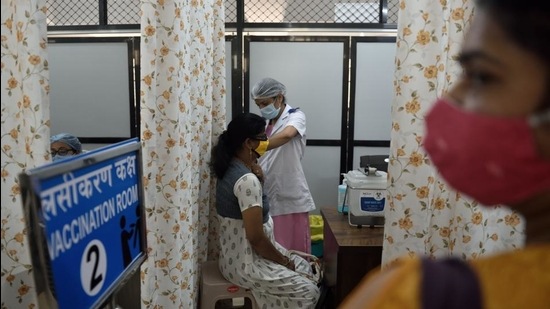 A Covid-19 vaccine shot being administered at Shatabdi Hospital. (Satish Bate/HT Photo)