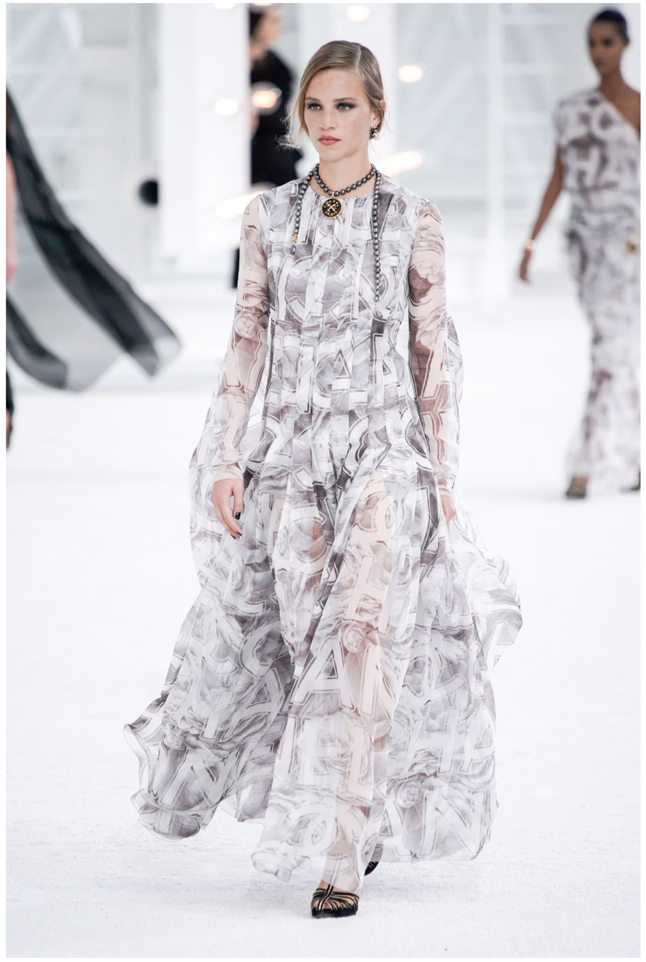 A Spring Summer 21 maxi with brand lettering print by Virginie Viard (Photo: Instagram/ChanelOfficial) A Spring Summer 21 maxi with brand lettering print by Virginie Viard (Photo: Instagram/ChanelOfficial)