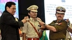 Athlete Hima Das being felicitated with the post of Deputy Superintendent of Police (DSP), by Assam Chief Minister Sarbananda Sonowal and the Director-General of Police (DGP) Bhaskar Jyoti Mahant at the Sarusajai Stadium, in Guwahati on Friday. (ANI Photo) Athlete Hima Das being felicitated with the post of Deputy Superintendent of Police (DSP), by Assam Chief Minister Sarbananda Sonowal and the Director-General of Police (DGP) Bhaskar Jyoti Mahant at the Sarusajai Stadium, in Guwahati on Friday. (ANI Photo)