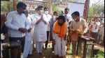 Sanjay Rathod (centre) staged a show of strength at Washim, where thousands of his supporters gathered, violating Covid norms. (HT FILE) Sanjay Rathod (centre) staged a show of strength at Washim, where thousands of his supporters gathered, violating Covid norms. (HT FILE)