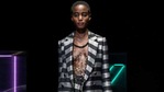 Against a backdrop of the brand's name lit up in colourful neon signs, models strutted down the catwalk to the sound of club music.(Reuters) Against a backdrop of the brand's name lit up in colourful neon signs, models strutted down the catwalk to the sound of club music.(Reuters)