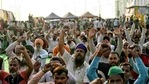Farmers shouting slogans at the demonstration site during the ongoing farmer protest against the new farm laws at Ghazipur Border, in New Delhi on Sunday. (ANI) Farmers shouting slogans at the demonstration site during the ongoing farmer protest against the new farm laws at Ghazipur Border, in New Delhi on Sunday. (ANI)