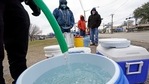 FILE - In this Feb. 18, 2021, file photo, a water bucket is filled as others wait in near freezing temperatures to use a hose from public park spigot in Houston. The snow and ice that crippled some states across the South has melted. But it has exposed the fragility of aging waterworks that experts have been warning about for years. Cities across Texas, Tennessee, Louisiana and Mississippi are still grappling with outages that crippled health care facilities and forced families to wait in line for potable water. (AP Photo/David J. Phillip, File)(AP) FILE - In this Feb. 18, 2021, file photo, a water bucket is filled as others wait in near freezing temperatures to use a hose from public park spigot in Houston. The snow and ice that crippled some states across the South has melted. But it has exposed the fragility of aging waterworks that experts have been warning about for years. Cities across Texas, Tennessee, Louisiana and Mississippi are still grappling with outages that crippled health care facilities and forced families to wait in line for potable water. (AP Photo/David J. Phillip, File)(AP)