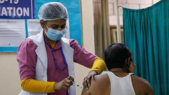 A man receives Bharat Biotech's Covid-19 vaccine called COVAXIN, at a vaccination centre, in New Delhi, India.(REUTERS)